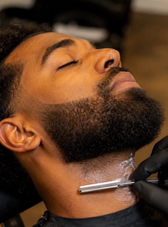 Beard trims, shaping, hot towels, and detailing.