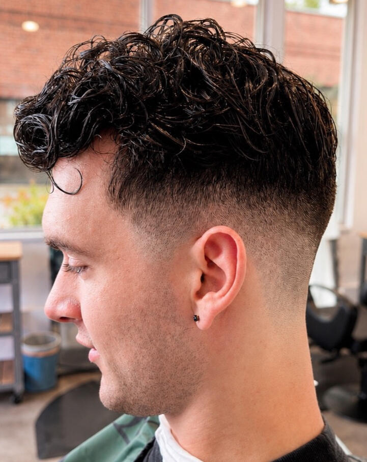 Modern cuts, fades, tapers, shear cuts, and styling.